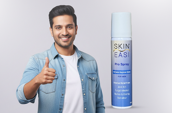 Smiling man giving a thumbs up beside SkinEasi Pro Spray bottle, showcasing men’s intimate hygiene and skin comfort solution.
